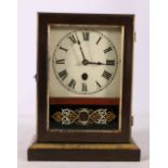 19th century mahogany and rosewood cased mantle clock with verre eglomise panel, the interior with
