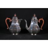 Pair of George V silver cafe-au-lait pots of tapering octagonal pear form with wooden scroll handles