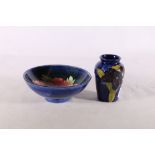 Moorcroft hibiscus pattern bowl 14cm diameter and an orchid pattern vase, 9.5cm tall, (2)