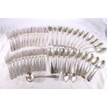 Suite of Irish silver flatware comprising twelve table spoons, twelve table forks, twelve dessert