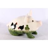 Griselda Hill Wemyss Pottery pig decorated with black cockerels, 32cm long