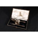 Victorian silver chirstening set comprising of fork, spoon and napkin ring by Goldsmiths &