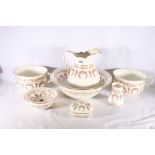 George Jones and Sons Crescent china wash set with rose decoration comprising ewer, basin, soap