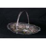 Edwardian Art Nouveau pierced silver swing handled basket decorated with C scroll, flowers and fruit