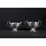 Edwardian Art Nouveau period silver sugar bowl and cream jug of good gauge by Robert Scott,