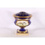 Porcelain baluster vase with rose spreader top, the body decorated with vignettes of birds raised on