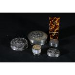Silver pill box decorated in repoussé with roses, 800 grade silver pill box, three others and a