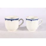 Two antique pearl ware coffee cans with relief floral decoration and blue rim bands, (2)