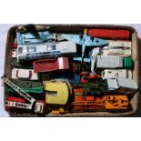 Approximately 30 playworn Dinky Toys model vehicles including 952 Vega Major Luxury Coach, 275