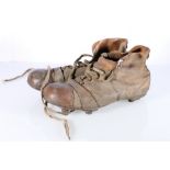 A pair of vintage leather football boots