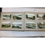 An early 20th century postcard album containing approximately 500 postcards most are English