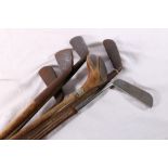 Six hickory shafted golf clubs including Ben Sawyers Benny putter,Mussleburgh iron etc.