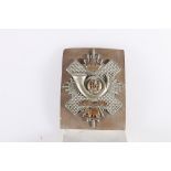 Scottish brass shoulder belt plate of the Highland Light Infantry 10cm x 8cm on white belt penned "