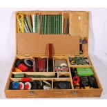 Meccano, a wooden hinge top case containing a good collection of Meccano parts and accessories
