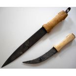Two African daggers reputed to be brought back from the Sudan War 1898. Both with Arabic Koranic