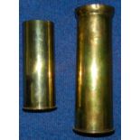 Two brass shell cases. one of 3 inch calibre, the other 18lbr. with flared neck.