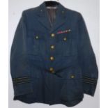 Royal Air Force dress uniform blue jacket having label penned "F/O Paynton Hughes" with VRT (