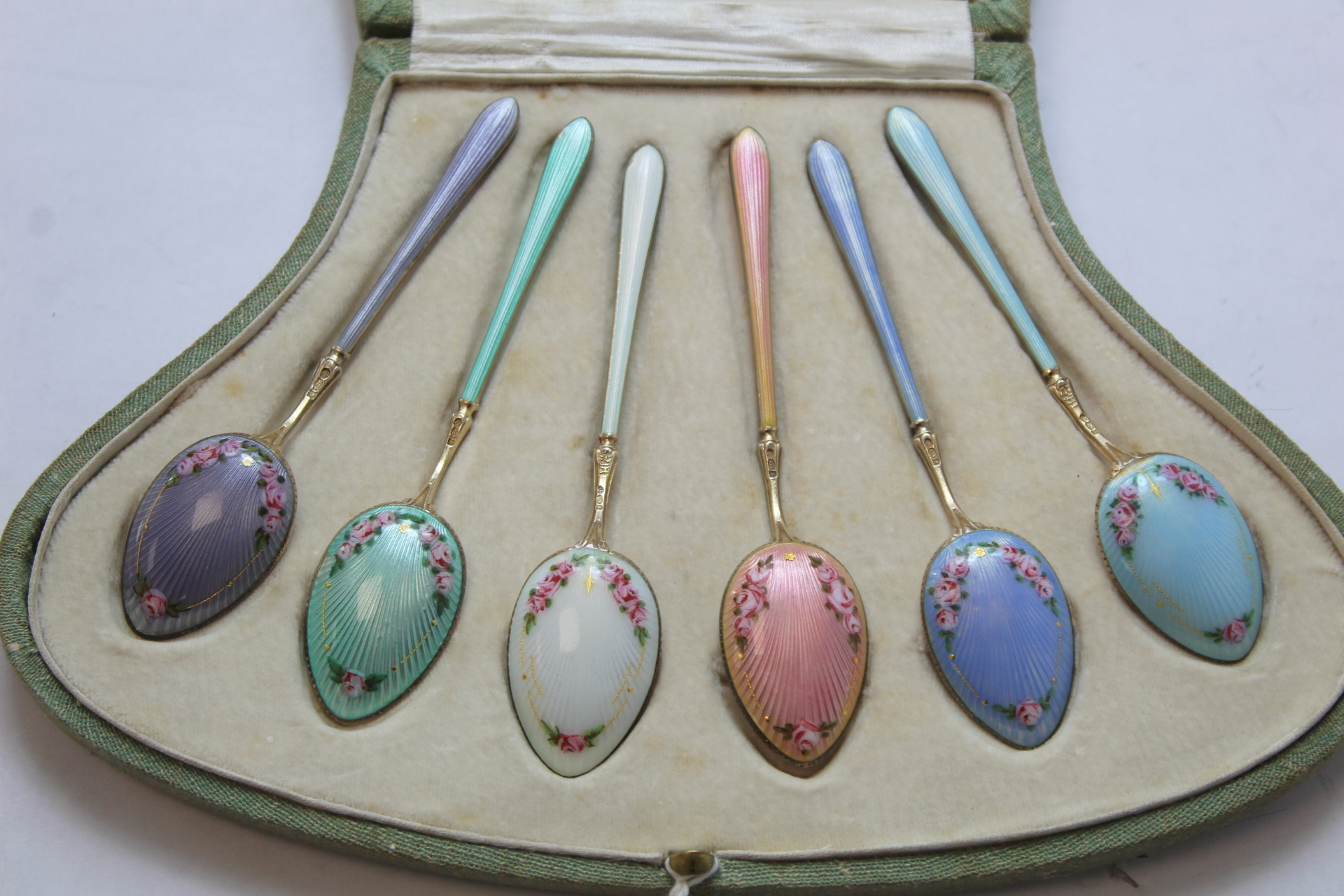 Set of six silver gilt coffee spoons with floral polychrome enamel, 1913, cased. - Image 2 of 4