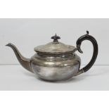 Silver three-piece tea set of compressed shape with bead edges, Birmingham 1931. 19oz.