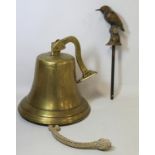 Antique brass narrowboat tiller pin in the form of a Kingfisher perched on a branch, 25cm high, also