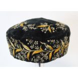 19th or early 20th century Victoria black velvet smoking cap with silk embroidered floral decoration