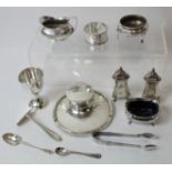 Silver capstan inkwell, Birmingham c.1900, five condiments and various other items.