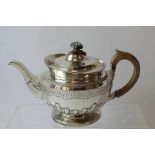 Silver tea pot, hemispherical, with embossed flutes and milk jug by Gibson & Langman 1889. 28oz.