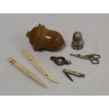 19th century vegetable ivory small sewing kit in the form of an acorn, containing thimble, needles