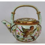 Victorian Aesthetic teapot of squat circular form with overhead loop handle decorated with birds