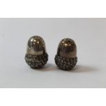 Pair of silver condiments modelled as acorns with loaded bases for 'salt' and 'cayenne' by S.