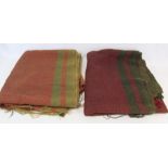 Two antique wool diamond weave blankets in reds and greens.