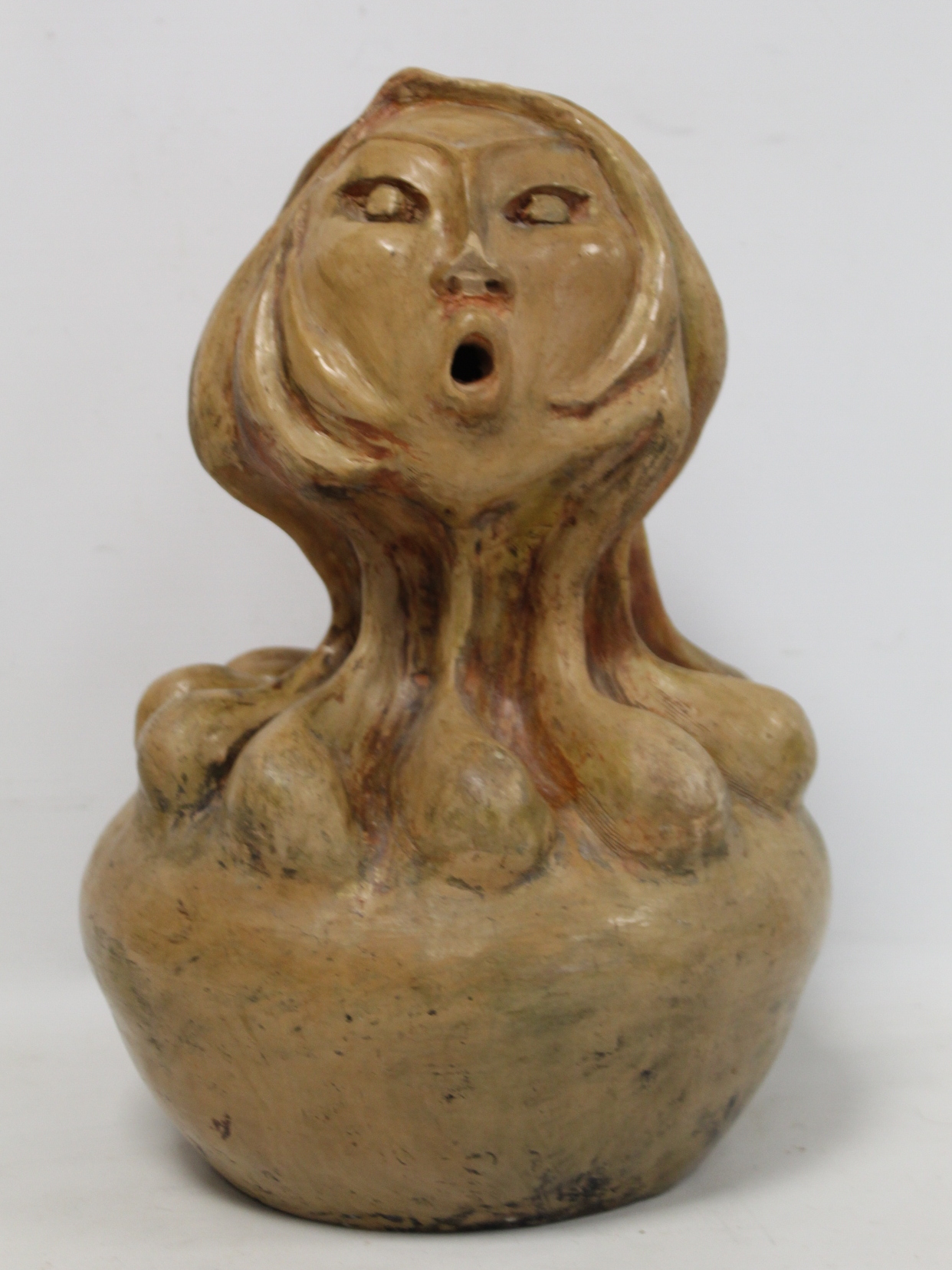 20th century Iranian Modernist terracotta sculpture of a female head on globular base, heightened