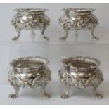 Impressive set of four cast silver salts of good gauge with cast swags and deeply gadrooned edges