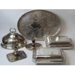 Oval embossed tray, two chamber candlesticks, an engraved dish cover and a pair of entree dishes and