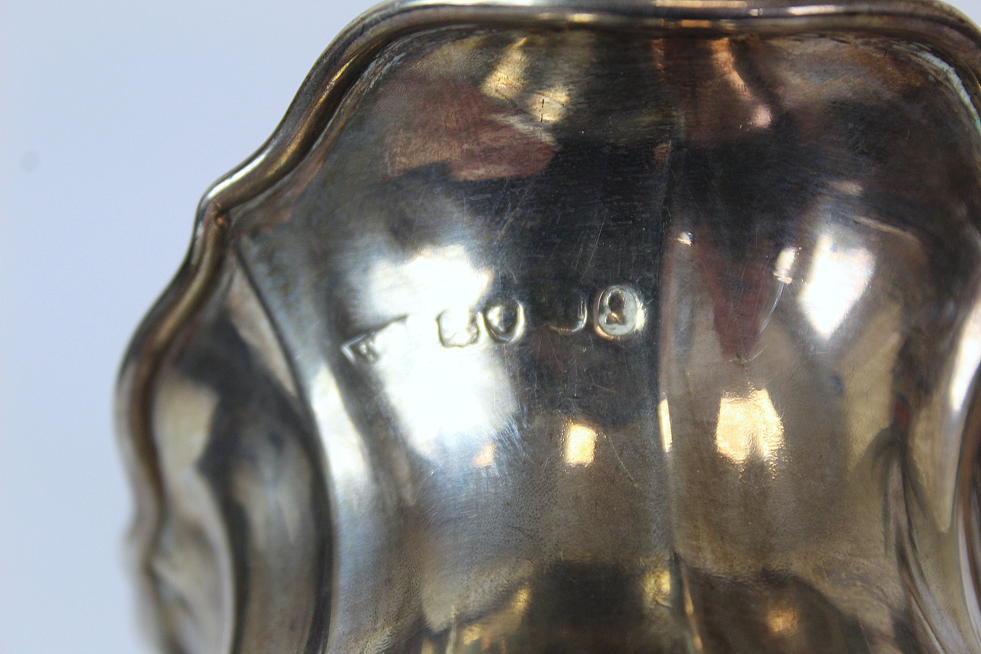 Silver cream jug of fluted baluster form with leafage handle on spreading foot, markers mark rubbed, - Image 2 of 3