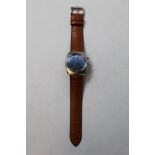 Gent's stainless steel Vulcain cricket alarm watch with blue dial, on strap.