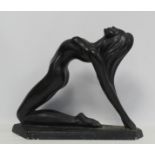 20th century Austin black painted sculpture of a stretching female nude after an original by