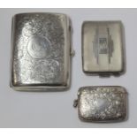 Engraved silver cigarette case, 1909 and two vesta cases. 3½ oz. (3).