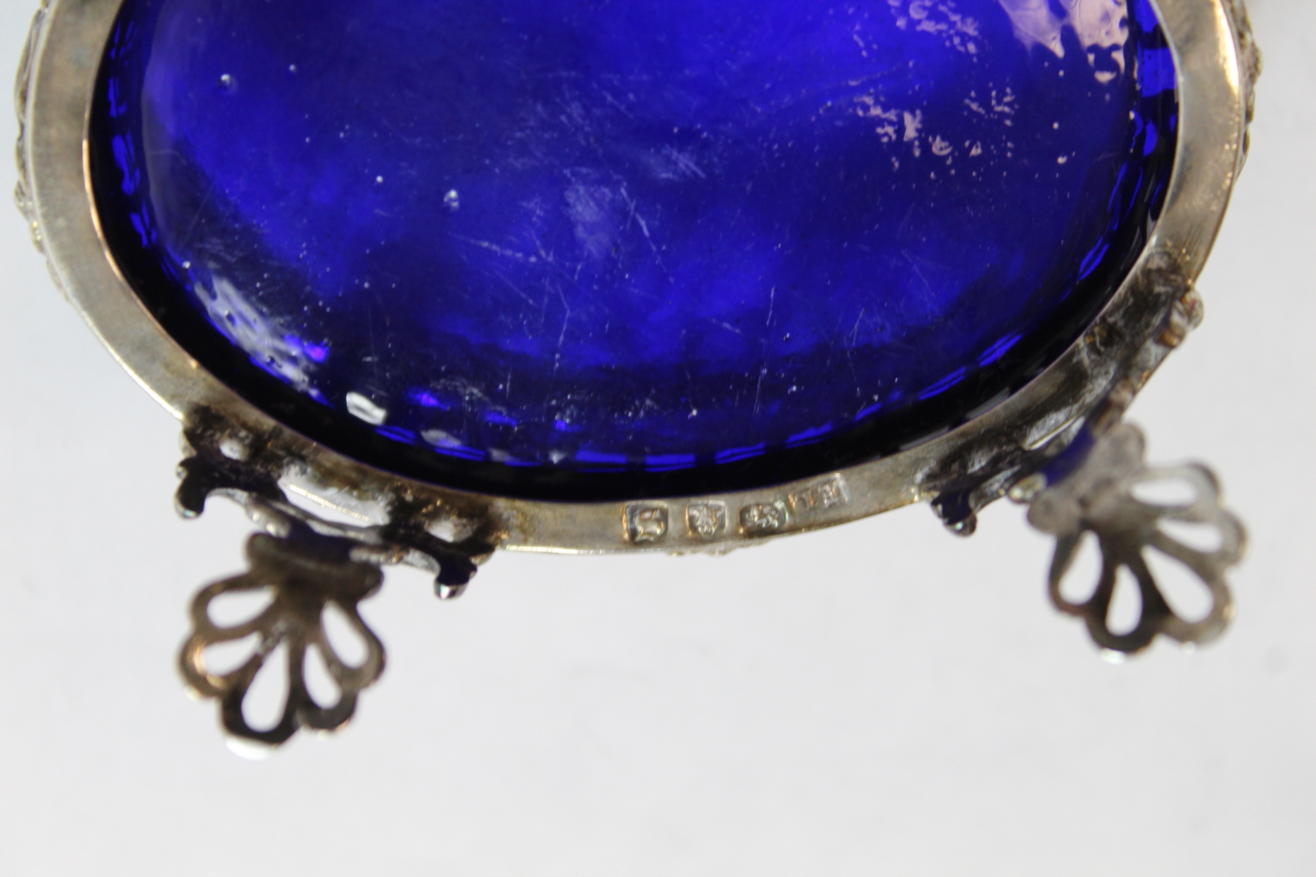 Set of four silver oval salts, pierced with applied embossed swags upon openwork spreading feet, - Image 8 of 8