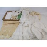 Two Victorian Broderie Anglaise baby's robes, another silk, crocheted cot blanket and various
