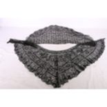 A 19th century finely worked black bobbin lace shawl collar, possibly Maltese with wheat ear flowers