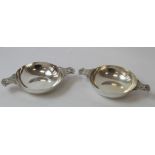 Pair of silver quaiches the grips with Celtic decoration by Wakeley & Wheeler 1949. 5½ oz.