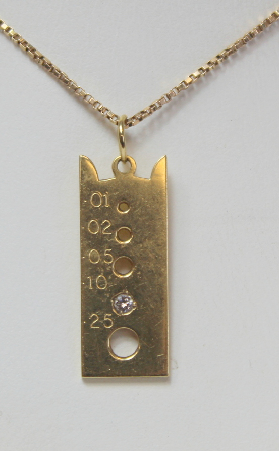 18ct gold pendant modelled as a diamond gauge with .10 of diamond on 9ct gold necklet.18ct - 7.7g, - Image 3 of 4