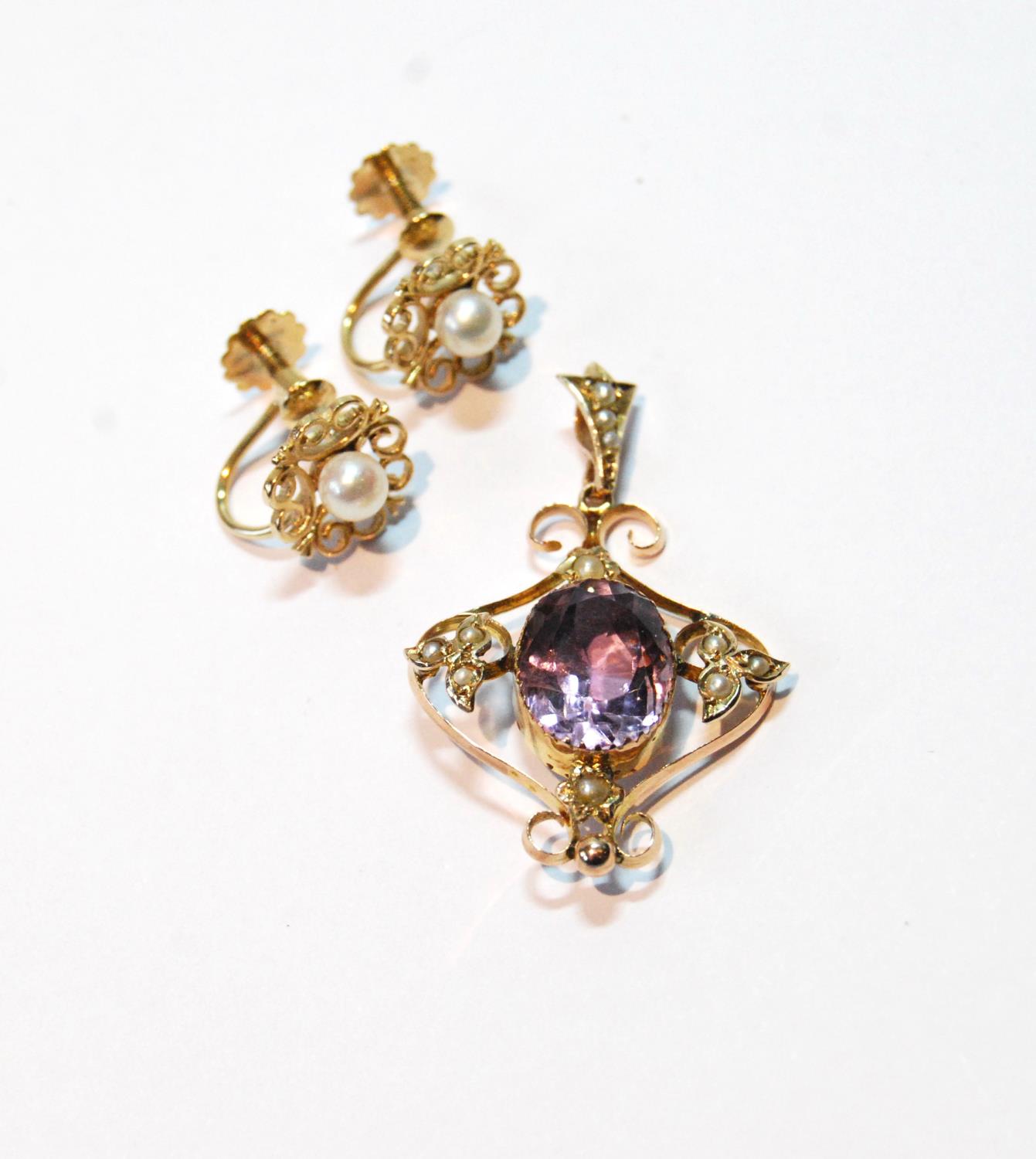 Edwardian gold openwork pendant with amethysts and pearls, and a pair of pearl earrings.