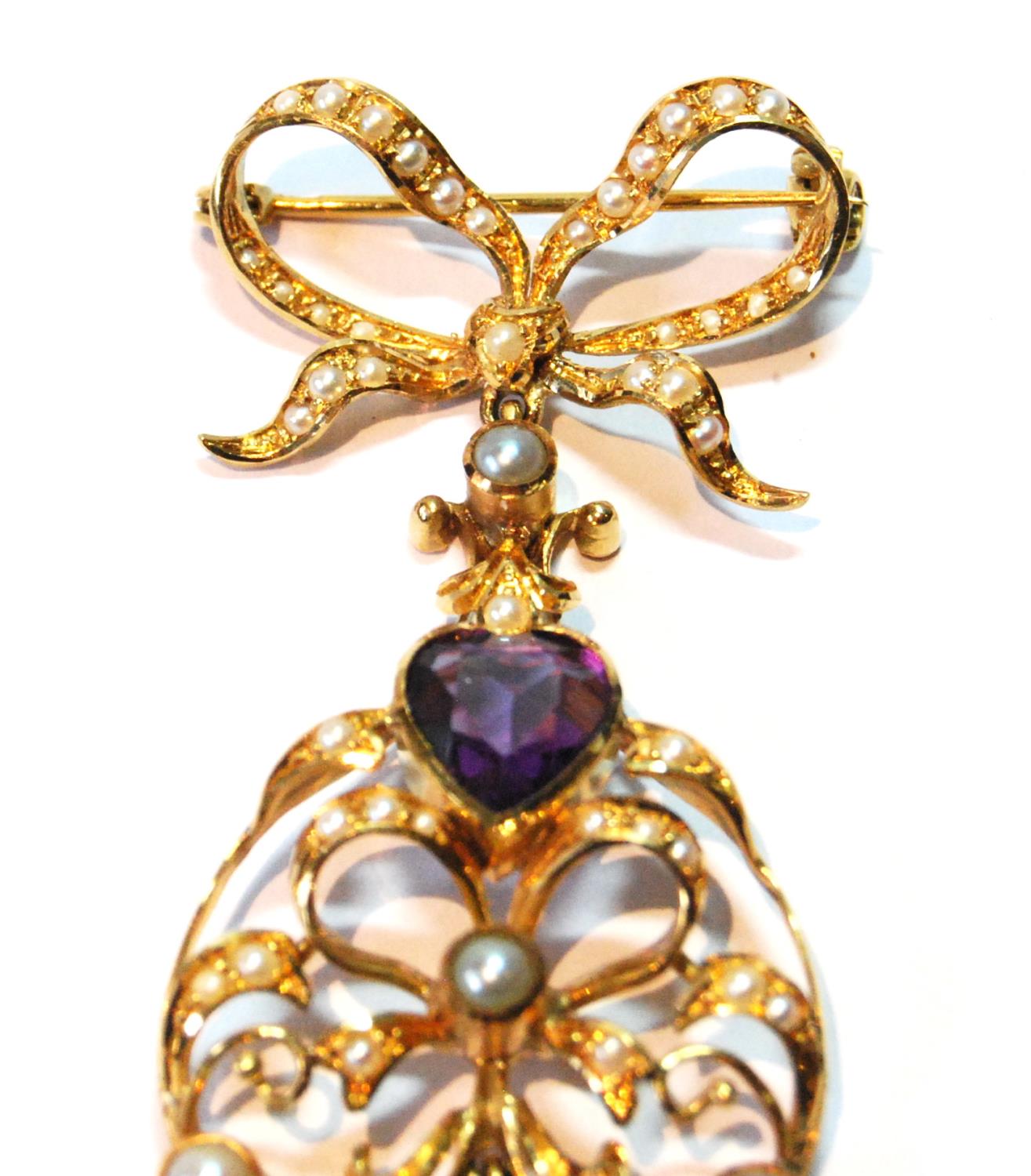 Gold brooch/pendant with amethyst and pearl drop dependant from a pearl-set bow, probably 15ct. - Image 2 of 4