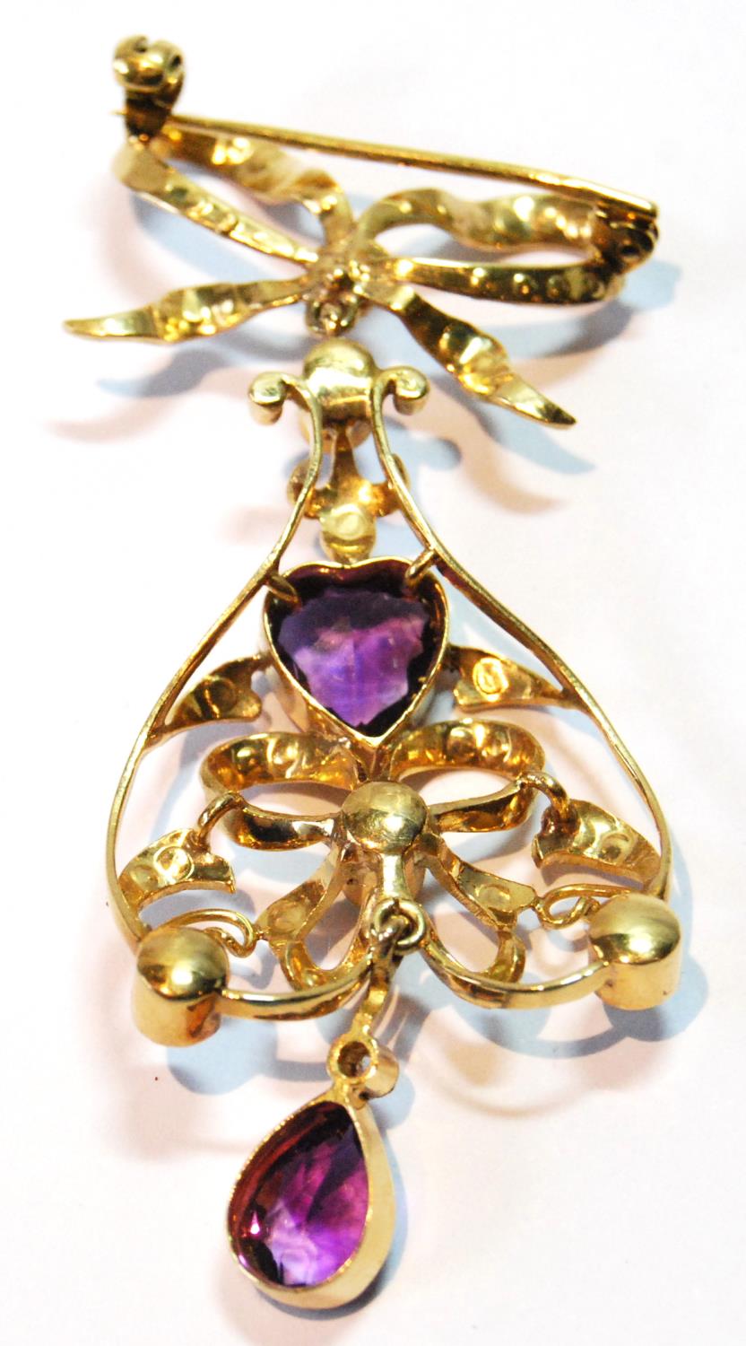 Gold brooch/pendant with amethyst and pearl drop dependant from a pearl-set bow, probably 15ct. - Image 4 of 4