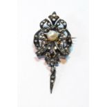 Early Victorian brooch/pendant with a pearl and rose diamonds, in gold fronted with silver.