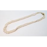 Cultured pearl necklace, two strands, graduated, on pearl and turquoise-set gold snap.