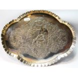 Silver toilet tray of lobed oval shape, embossed, Chester 1899, 14oz.