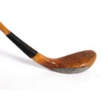 Long nose golf club by F.H. Ayres, lead filled with horn foot.